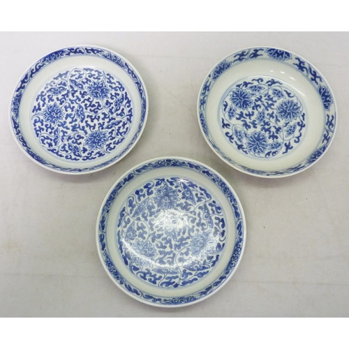 A pair of Chinese blue and white plates, each 153mm diameter; a single similar plate. (3)