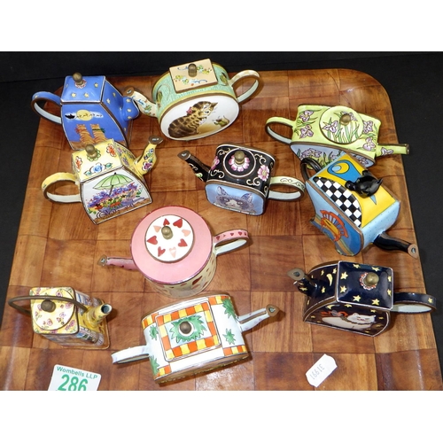 286 - A group of miniature enamel teapots AF