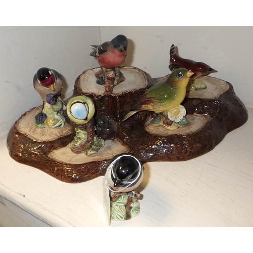 287 - A group of small Beswick birds and stand (7)