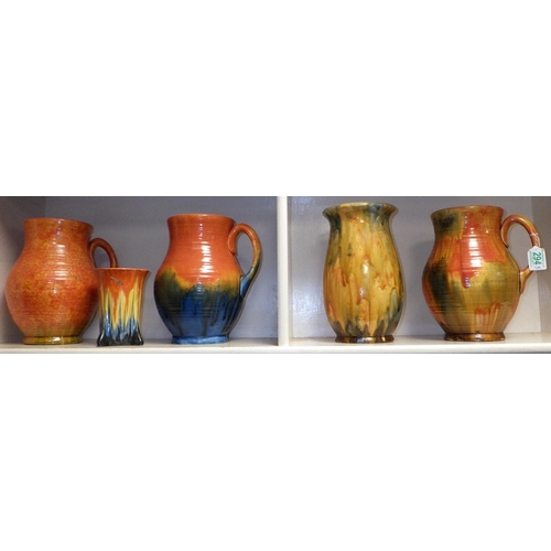 294 - A group of Crown Devon jugs, vases together with a Clarice Cliff dolphin bowl and a Wedgwood bowl (7... 