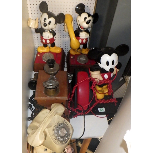 326 - A qty of Mickey Mouse phones etc, All AF