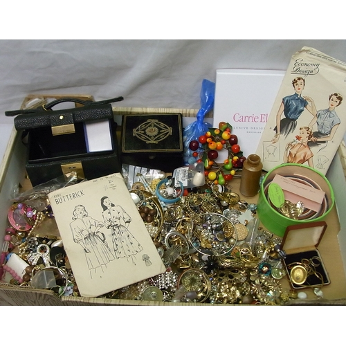 225 - A qty of costume jewellery, sewing patterns etc.