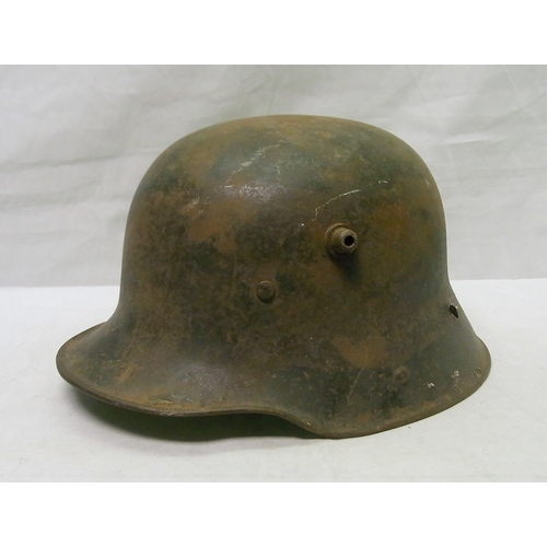 345 - Military interest: a German m16 Stahlhelm helmet with three piece padded leather liner on leather ba... 