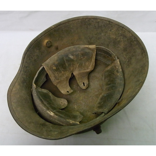 345 - Military interest: a German m16 Stahlhelm helmet with three piece padded leather liner on leather ba... 