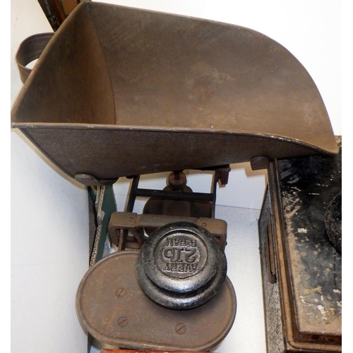 379 - Two sets of weighing scales, till and a tin box