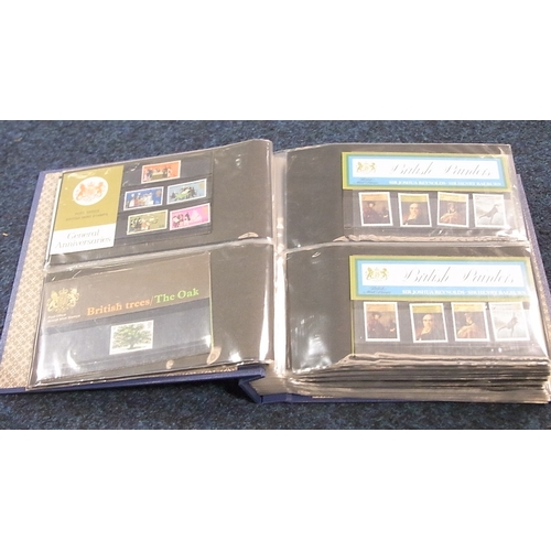 220 - Postage Stamps: an album containing approximately 80 presentation packs of UK mint collectors' issue... 
