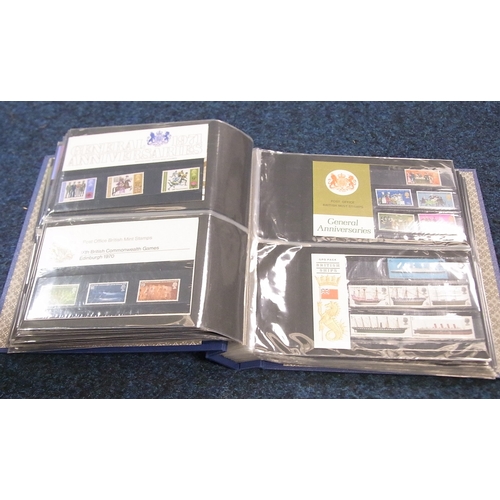 220 - Postage Stamps: an album containing approximately 80 presentation packs of UK mint collectors' issue... 
