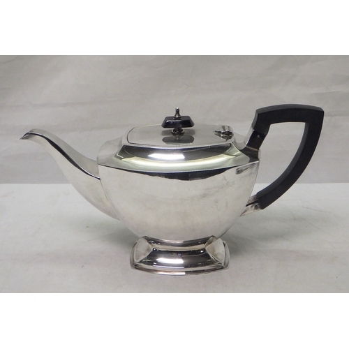 6 - An Art Deco influence silver three piece tea set comprising teapot, milk jug and sugar bowl, John Lo... 