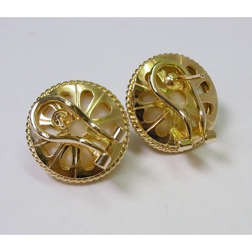 52 - A pair of mabe stud earrings, yellow metal  marked 585, 17mm diameter.