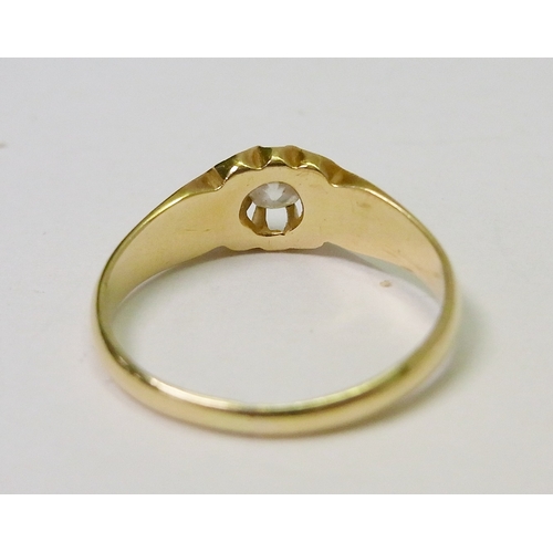 59 - A diamond solitaire ring comprising an old cut stone in a 