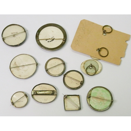 67 - Seven various Ruskin pottery circular cabochon brooches, the largest 50mm diameter; a square Ruskin ... 