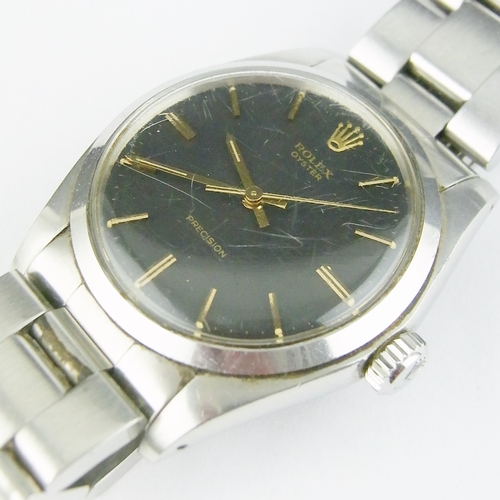 81 - A Rolex Oyster Precision 6426 comprising a manual wind movement under a grey / black dial marked 