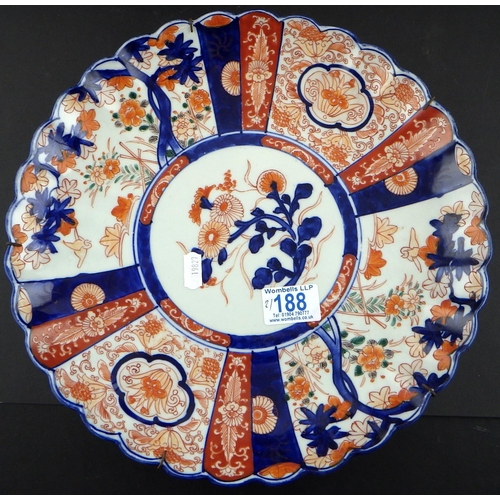 188 - An Imari charger 30cm diameter together with a restored Imari onion bottle vase (2)