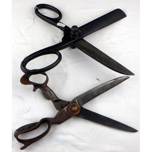 189 - A pair large Plum of London iron tailors scissors 37cm long together with a similar unmarked steel p... 