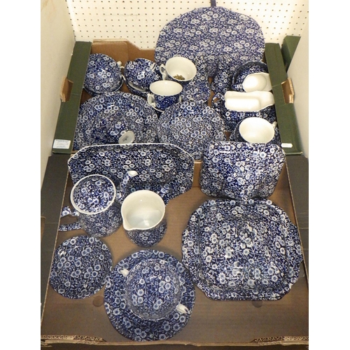 244 - Two boxes of Calico Burleigh blue & white table ware (2)