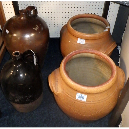 250 - Two earthen ware flagons together with a pair of pots (4)