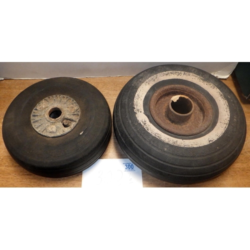300 - Military interest: two aeroplane wheels, both tyres worn, believed German similar to those used on B... 