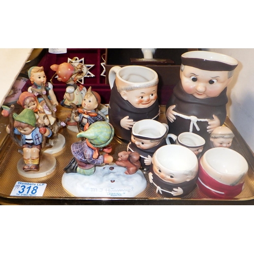 318 - A collection of Hummel / Goebel figures and Christmas decorations