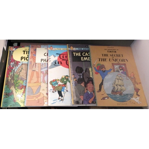 325 - A qty of Asterix, TinTin books etc