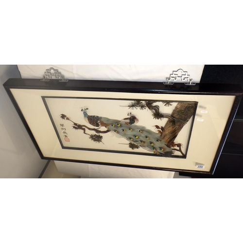 290 - An Oriental relief framed peacock 89 X 50cm
