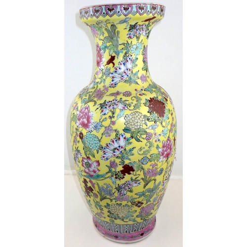 124 - A large Oriental yellow vase together with two Chinese plates (3)