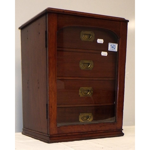 143 - A Victorian table-top collectors' cabinet comprising four baize-lined drawers behind a glass-panel d... 