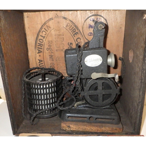 145 - A Pathescope Kid cine film projector with films reels incl Disney interest and Nicki Stevens in Stri... 