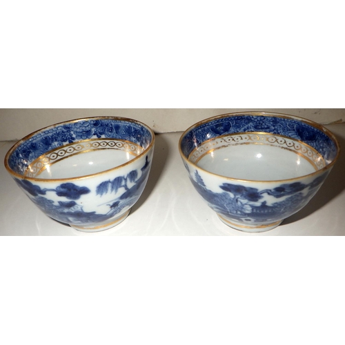 160 - A pair of Chinese export blue and white tea bowls with clobbered gilt decoration; another pair of Ch... 