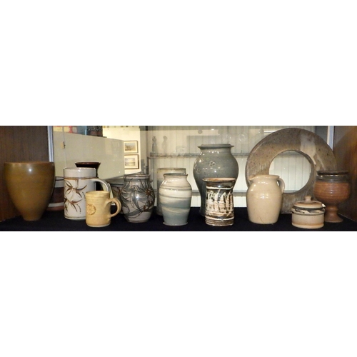 166 - A collection of studio pottery, some a/f.