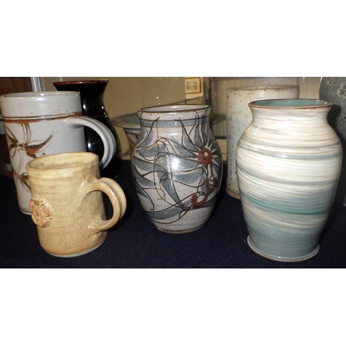 166 - A collection of studio pottery, some a/f.