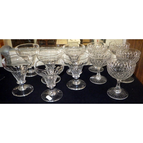 169 - Five matching cut glass champagne saucers; six matching trumpet bowled petal glasses.  (11)