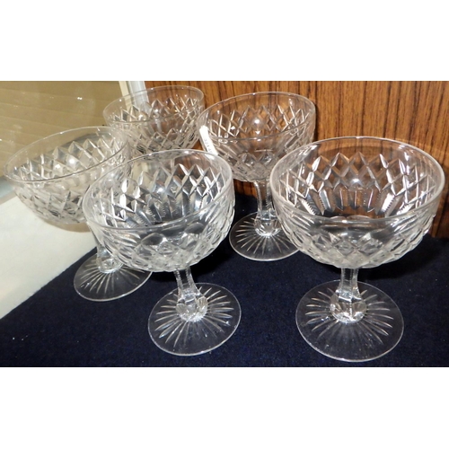 169 - Five matching cut glass champagne saucers; six matching trumpet bowled petal glasses.  (11)