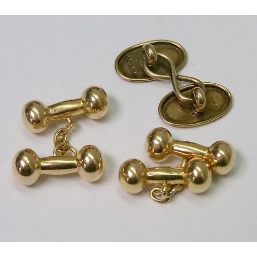 114 - A pair of chain link dumb bell shaped cufflinks, 15ct gold, heads 19mm long, 5.5g; other cufflinks a... 