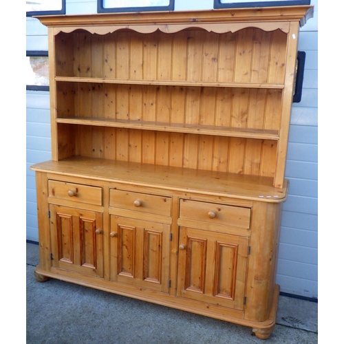 707 - A reproduction pine dresser with three door base, 185cm wide