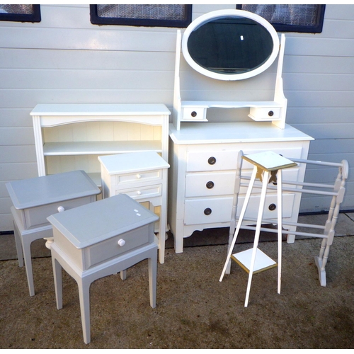 714 - A painted dressing chest, bookcase, pair of bedside tables, towel rail, plant stand and bedside ches... 