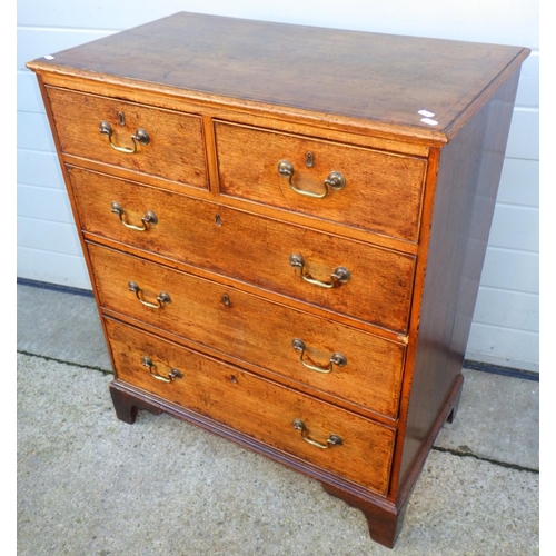 719 - A 19th cen oak and mahogany banded chest of drawers, with later feet and handles, 82cm wide