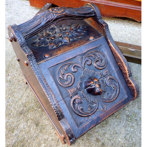 720 - A Victorian carved oak coal scuttle, flap split, walnut dressing chest, blue painted tub chair and a... 