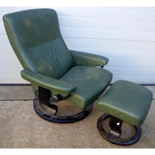 723 - An Ekornes green stressless chair and stool (2)