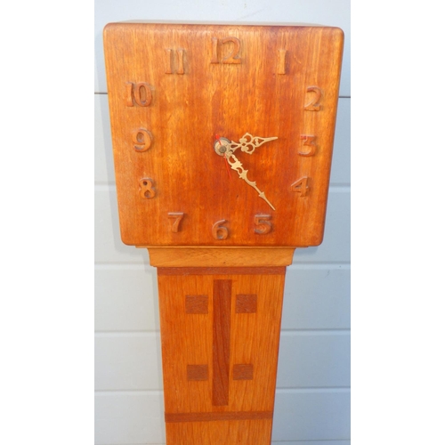 726 - A 1930's light oak Grand daughter clock case with later battery movement, a/f 134cm tall