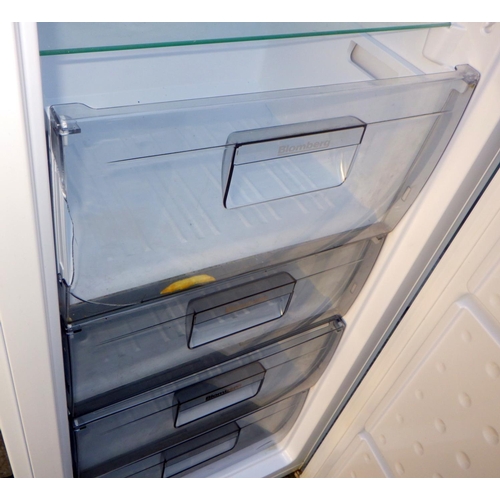 728 - A Blomberg freezer, one drawer cracked, 174cm tall