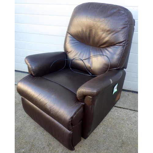 729 - A brown leather electric recliner chair, some wear