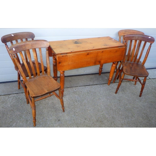 741 - A pine drop leaf table together with four Victorian kitchen chairs (5)