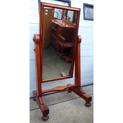 751 - A mahogany cheval mirror, 140cm tall