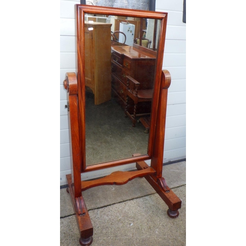 751 - A mahogany cheval mirror, 140cm tall