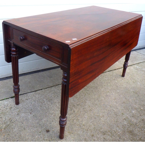 753 - A 19th cen mahogany drop leaf table on reeded legs, 122cm long