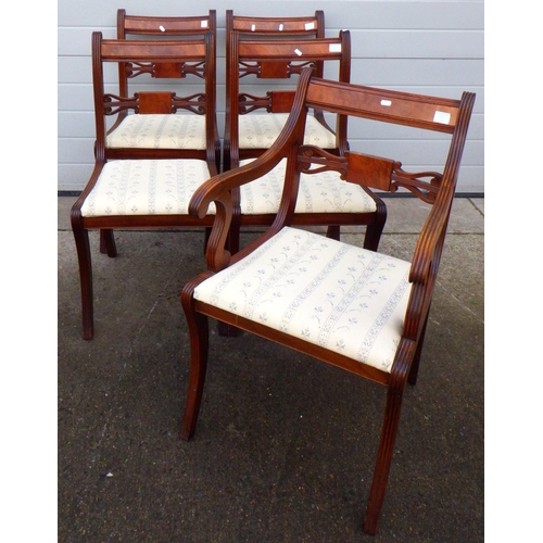 768 - A set of five reproduction mahogany dining chairs incl one carver