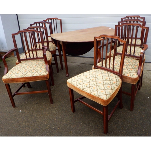 769 - A Geo III mahogany, pad foot, drop leaf dining table together with a set of eight dining chairs with... 