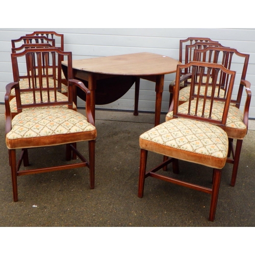 769 - A Geo III mahogany, pad foot, drop leaf dining table together with a set of eight dining chairs with... 