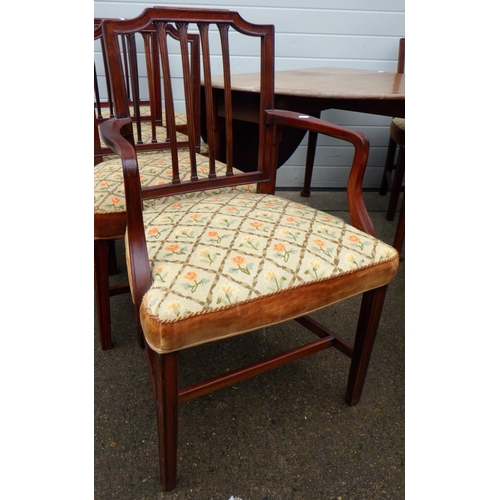 769 - A Geo III mahogany, pad foot, drop leaf dining table together with a set of eight dining chairs with... 