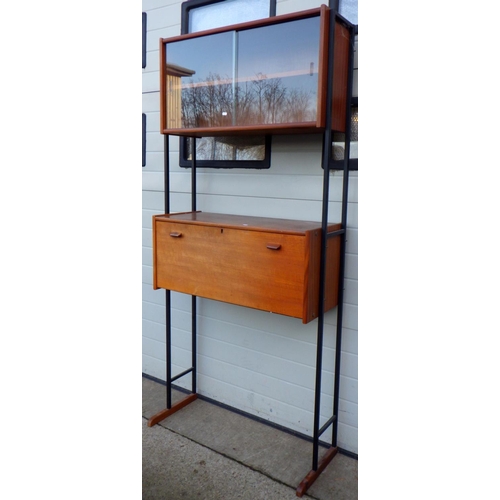 775 - A teak side unit, in the manner of Ladderax but fixed, 93cm wide